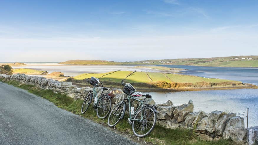 Two bikes on a road beside Maghera Beach in Co. Donegal