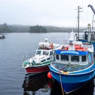 Boats docked at Glengarriff Harbour in County Cork.