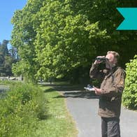 Harm Deenen, wildlife expert overlooking the castle lake on a nature survey walk around Johnstown Castle