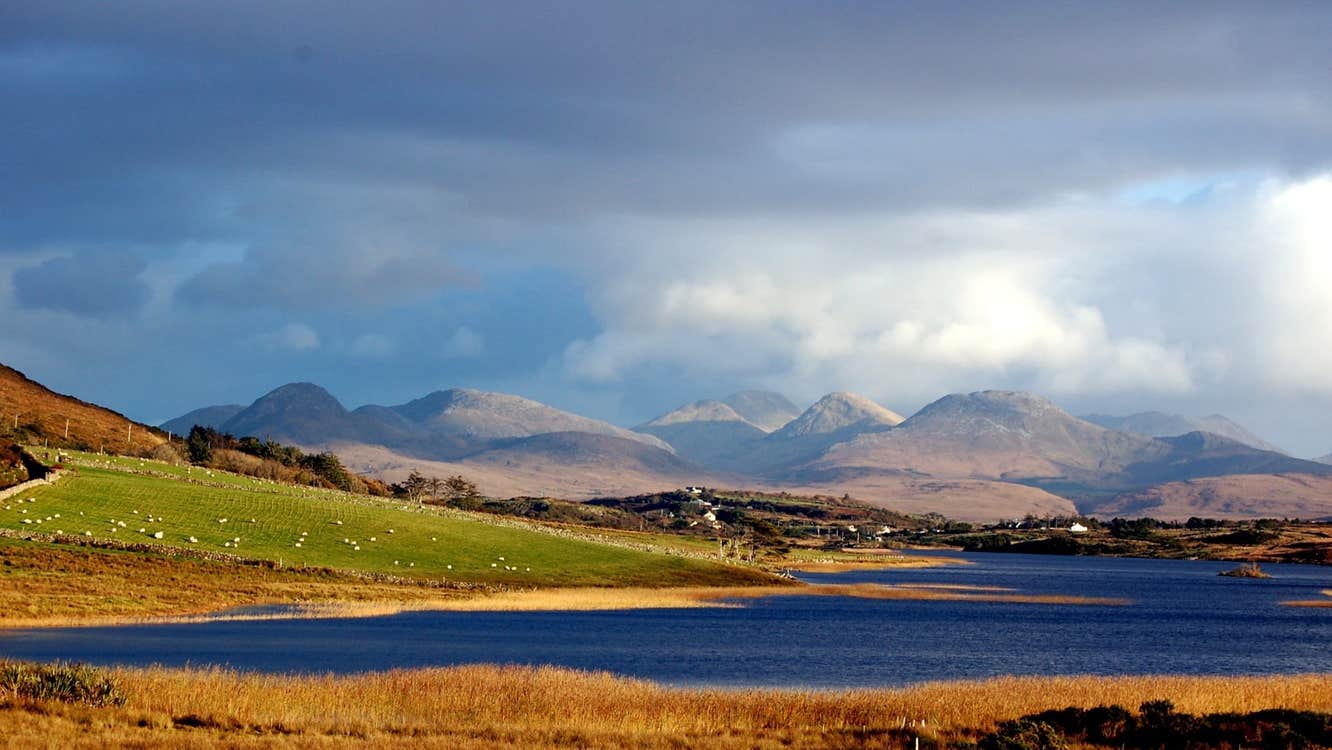 An image of Connemara lakes with the Twelve Bens Mountain Range in the background