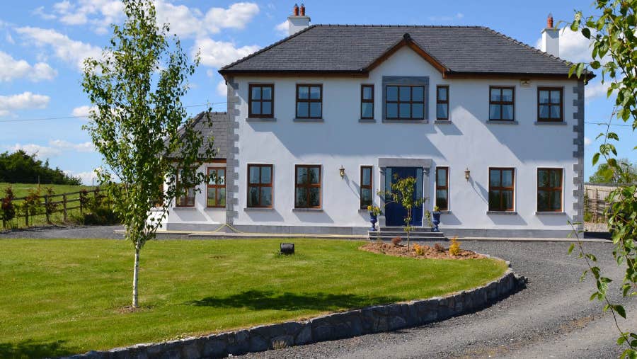 Front of house with green garden