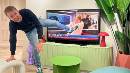 An illusion room at the museum with what appears as a man coming out of a television