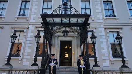 City officials bear the ceremonial mace and sword of state on the steps of the Mansion House, official residence of Dublin's Lord Mayor—a symbol of civic tradition in the city Frederick Douglass came to know during his 1845 visit.