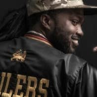 The Wailers for their 50 Years of Positive Vibrations tour, rear view of man's jacket with name embroidered on it