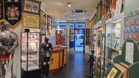 Shop interior with lots of heraldic items for sale