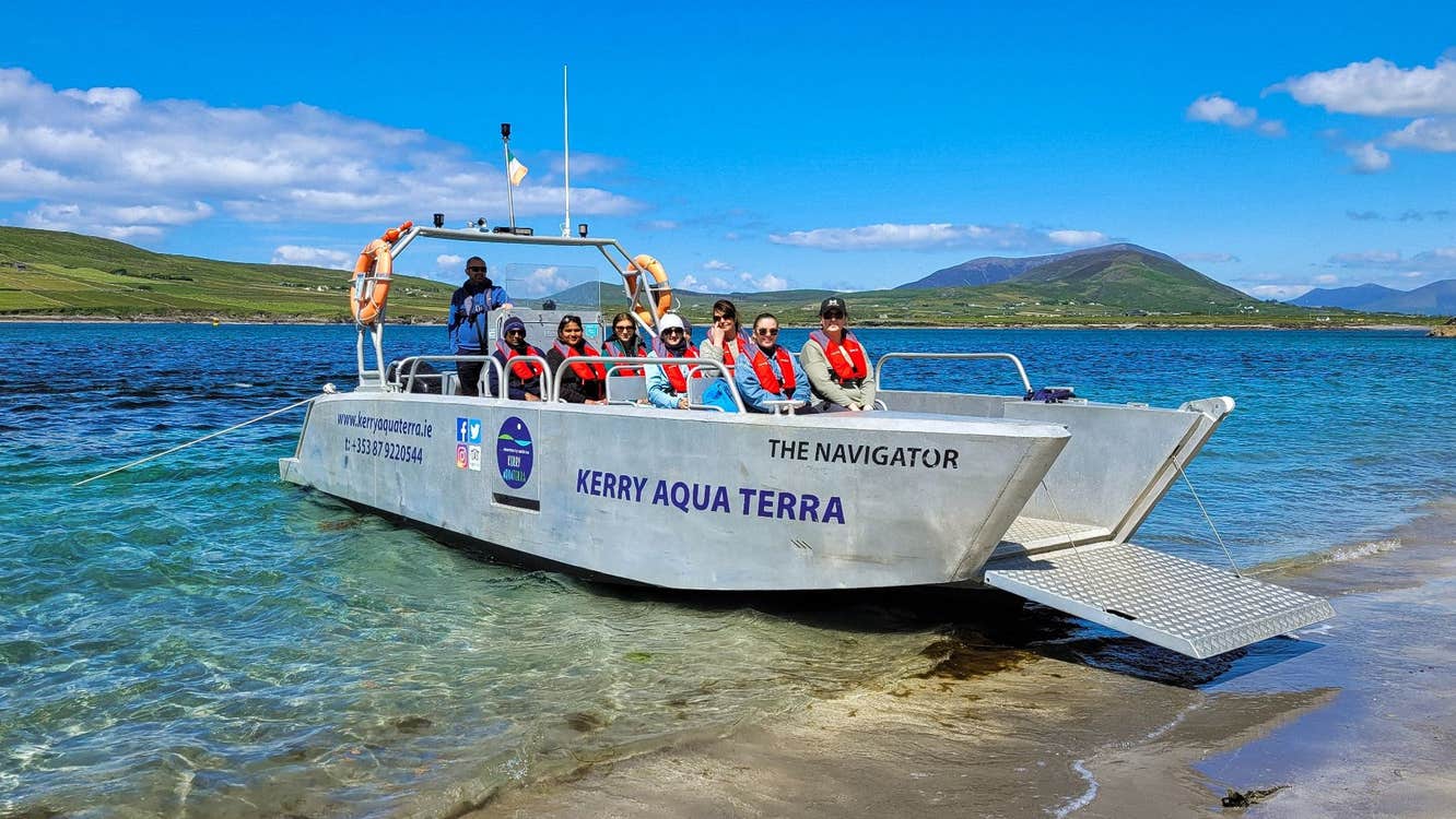 A boat called The Navigator moored on the shore