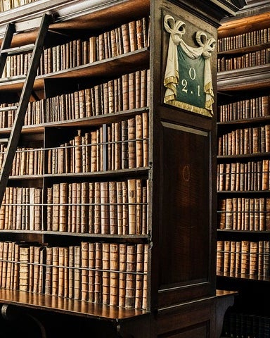 A room with rows of bookshelves