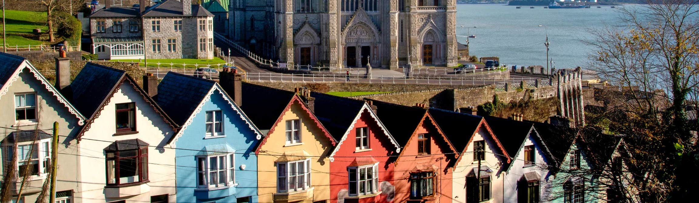 Colourful houses in front of Cobh Cathedral, County Cork