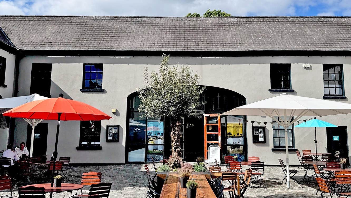 A tea room with outdoor tables and seating