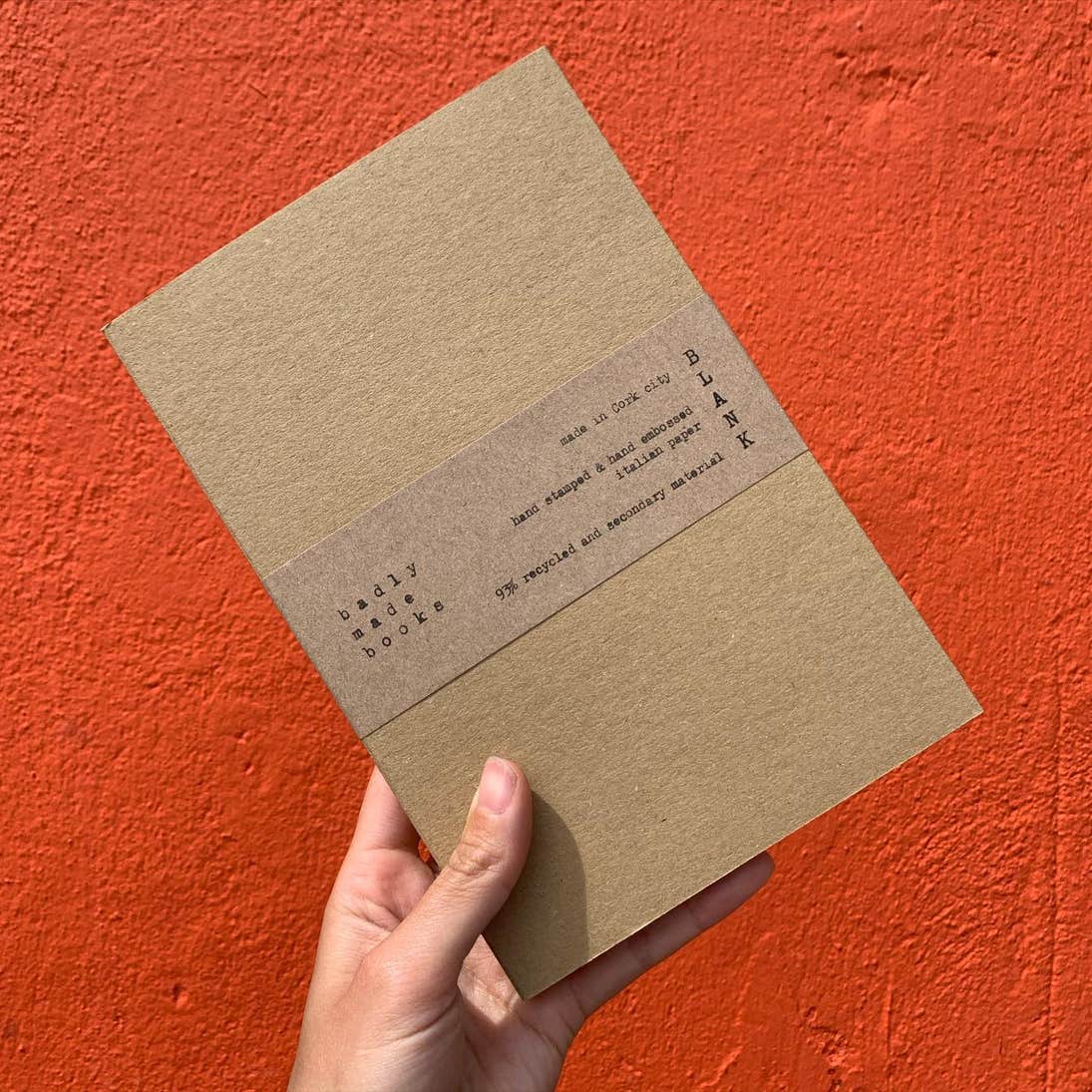 Keep a travel journal of your visit to the city in a handmade notebook by Badly Made Books.