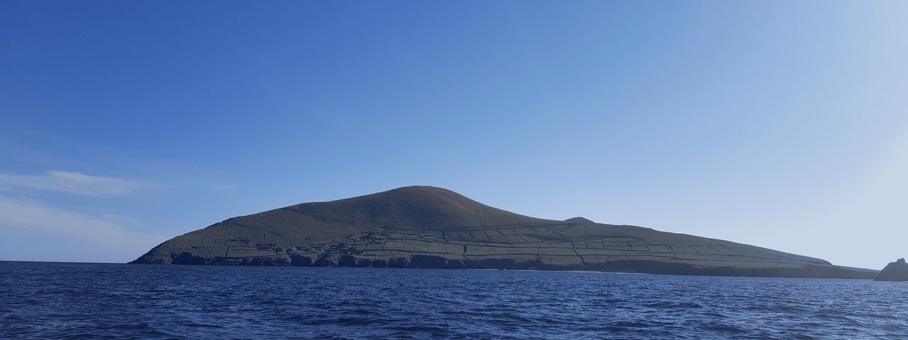 A photograph of great blasket island from across the water