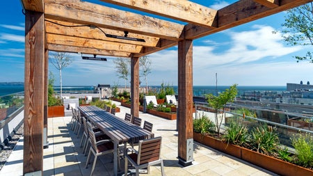 Outside seating area with tables and chairs