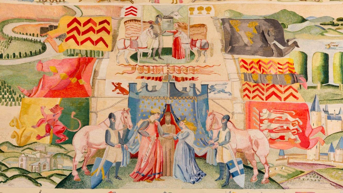 Tapestry showing a wedding scene with a castle behind three people