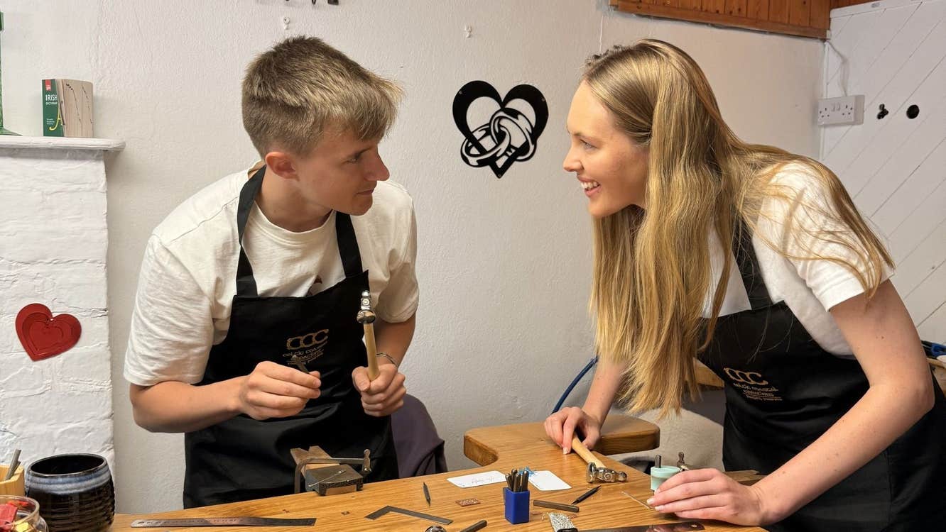 Couple making jewellery in a workshop