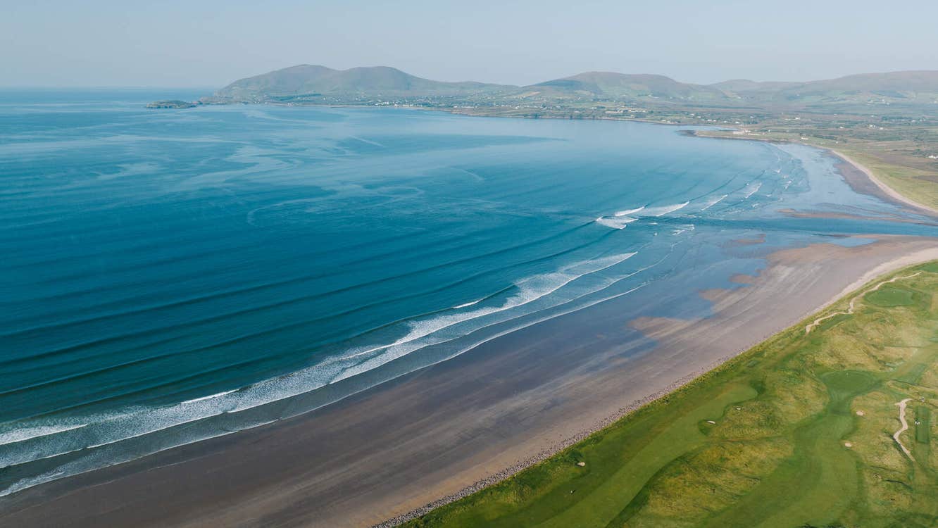 Aerial view of a sandy beach and blue seas