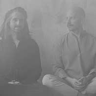 Metronome: Homebeat Present: Holden & Zimpel - grey photo of 2 men seated cross legged against a plain wall.