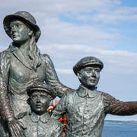 Statue of an emigrant family at the Cobh Heritage Centre – the Emigration & Maritime Story in County Cork.