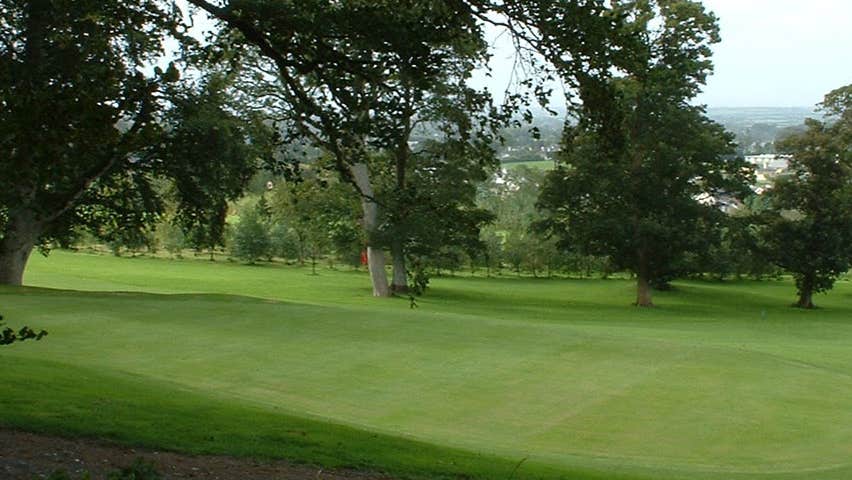 Golfer walking along the fairway at Abbeyleix Golfclub