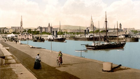 By the early 20th century, Kingstown had become a fashionable and stylish Victorian town. The harbour and the waterfront were busy with elegantly dressed people wining and dining at the local yacht clubs and strolling along the East Pier.