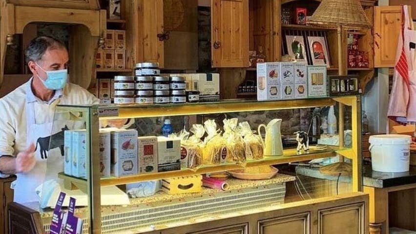 A deli counter with food on display