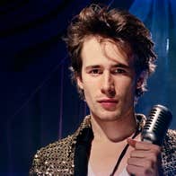 Jeff Buckley holding a microphone.