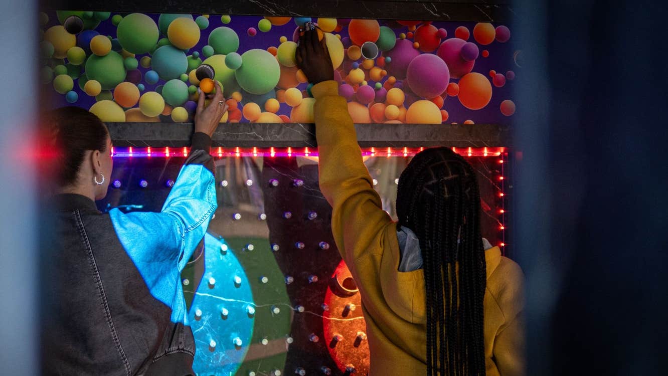 Two girls playing a ball game