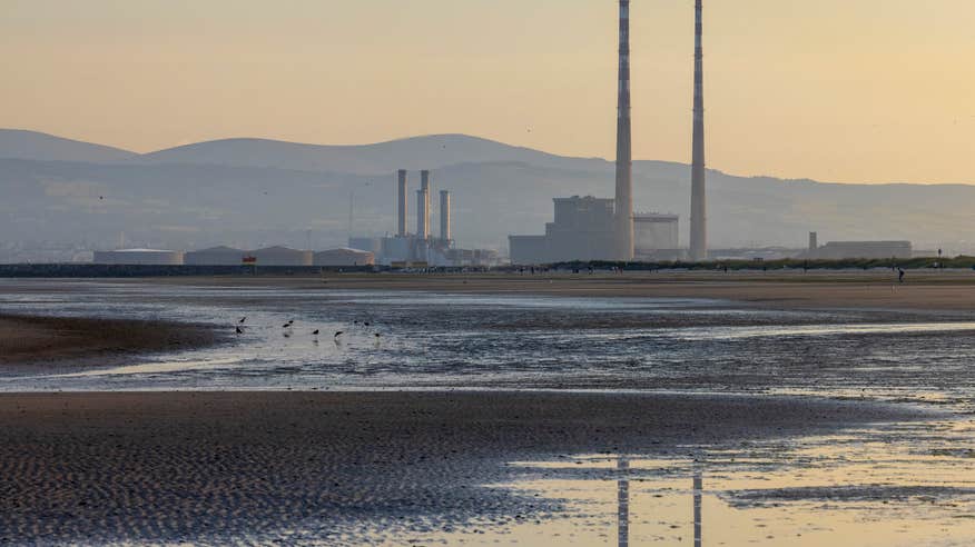 A view of the Poolbeg Chimneys from Dollymount Strand in County Dublin