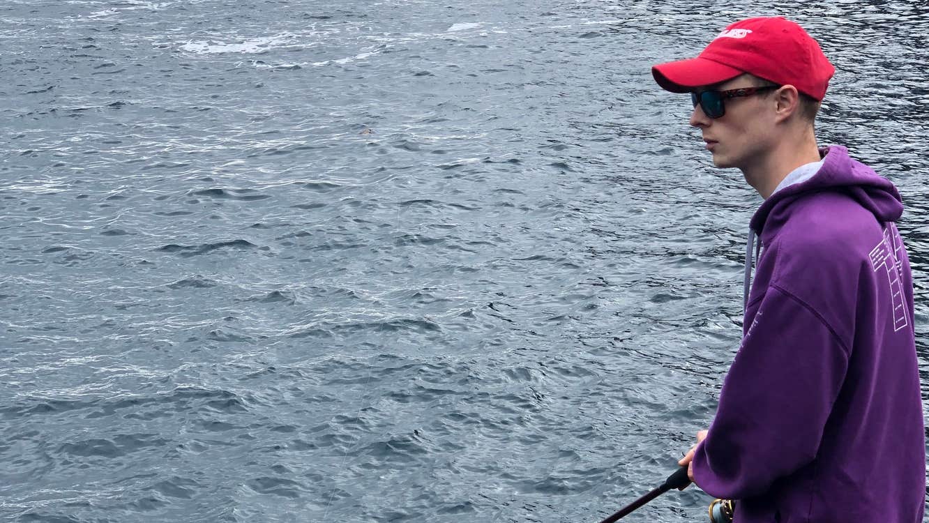 A man angling from the shore