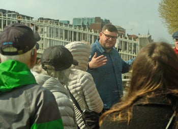Historical Walking Tour of Dublin with guide at the Ha'penny Bridge
