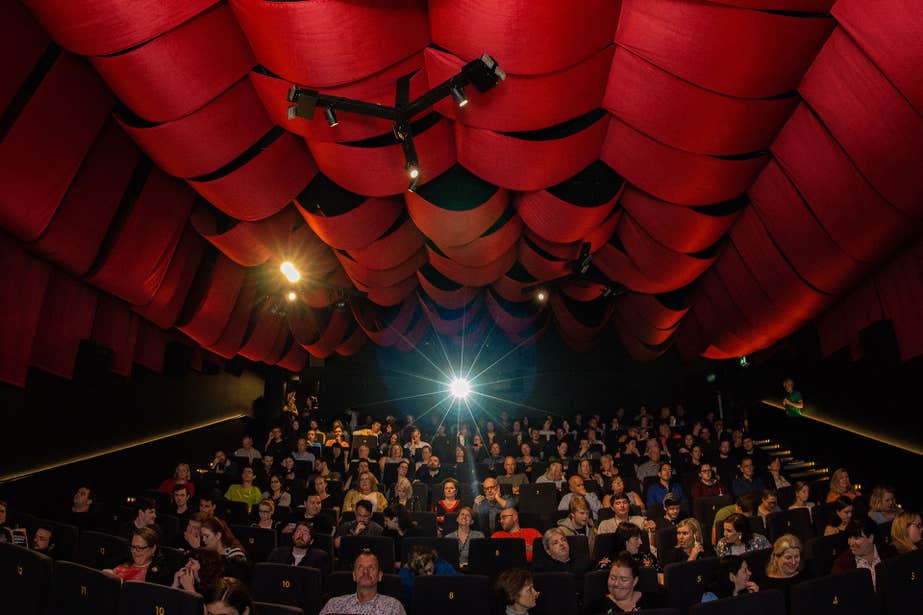 A full audience at the Galway Film Festival inside a theatre.