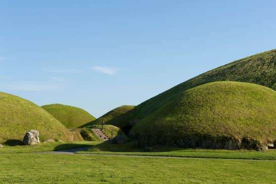 Ancient green mounds at Knowth in Meath