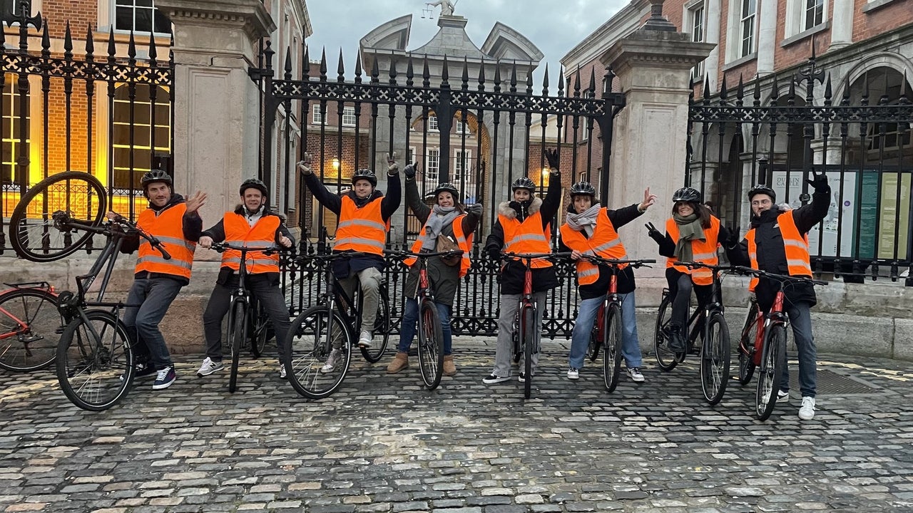 Group in high visibility vests on bikes in Dublin City Centre