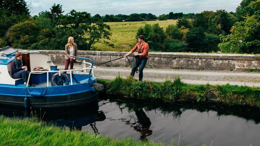 People on board a barge getting ready to set sail in Sallins, Kildare