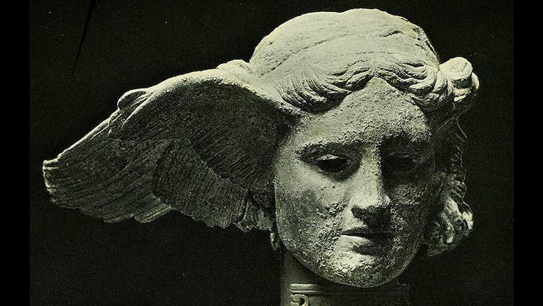 English band, These New Puritans. Head in stone of an ancient god