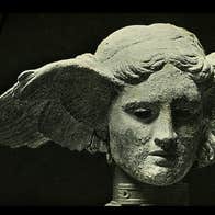 English band, These New Puritans. Head in stone of an ancient god