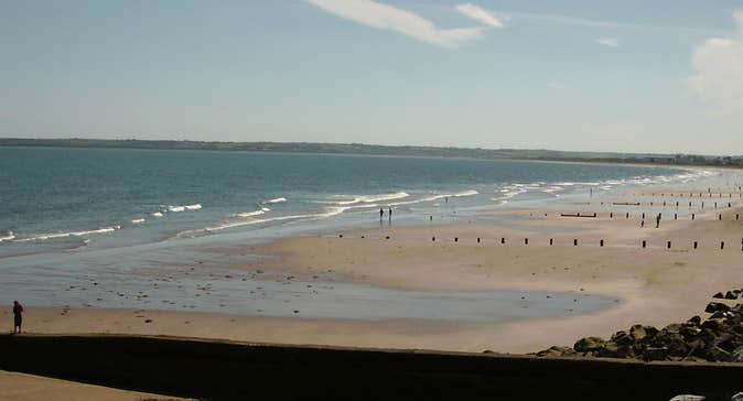 A view of Youghal Claycastle Beach on a summer's day