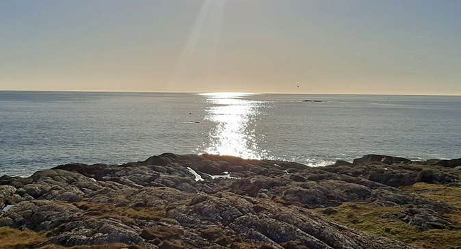 Ionad Na Feamainne Seaweed Centre coastline at sunset