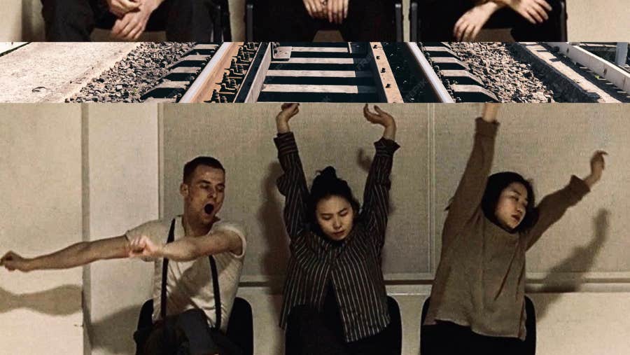 Station of Echoes – Fluid Tracks - Line of 3 seated people stretching in different directions