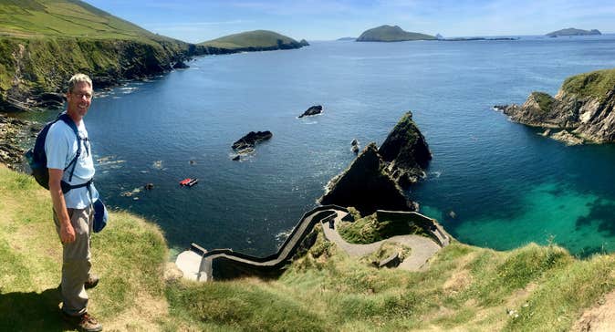 Man standing beside cliff edge