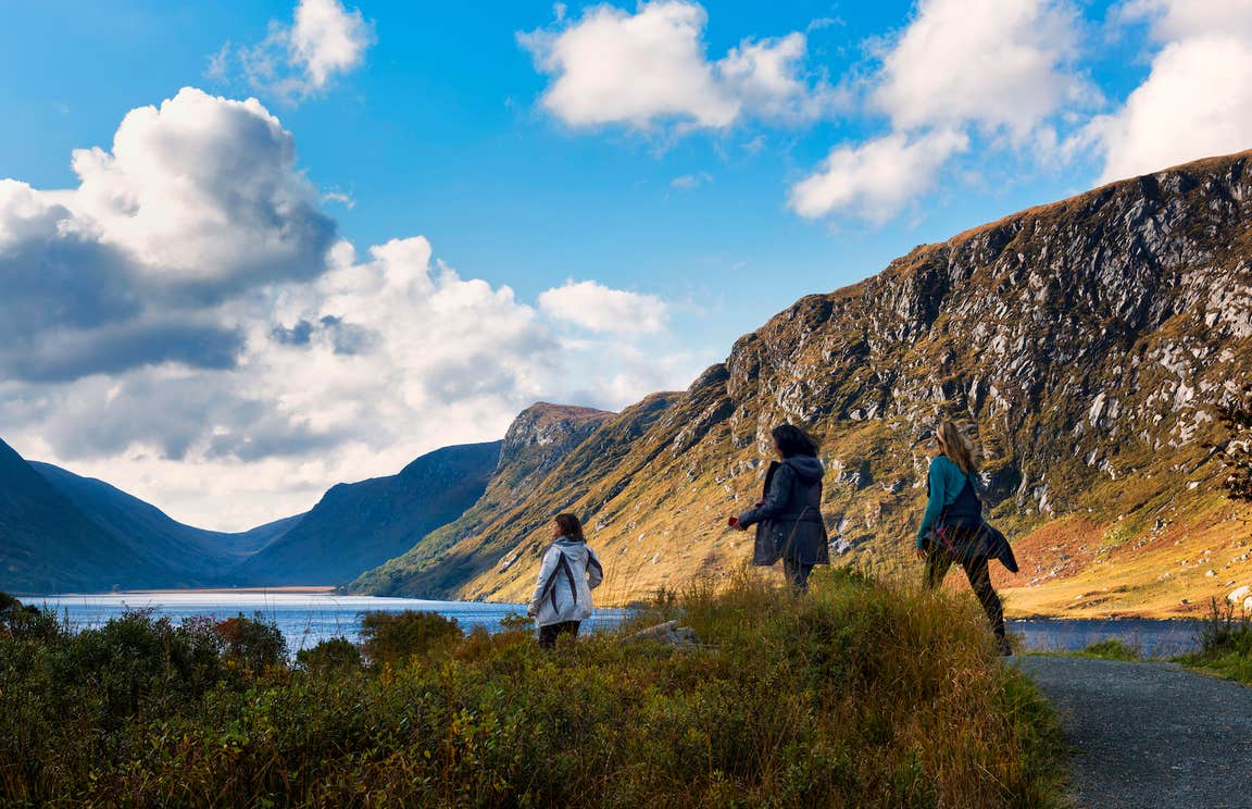 Three people hiking in the Glenveagh National Park in County Donegal.