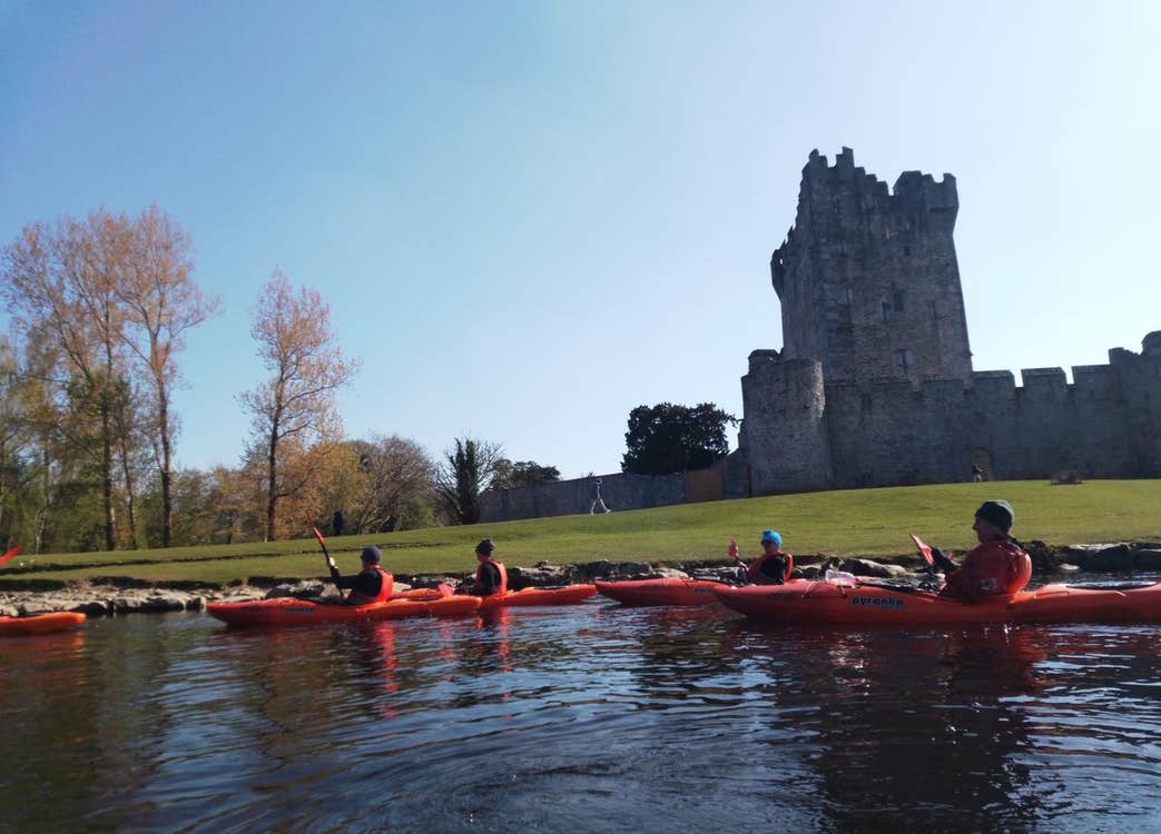 A group of kayakers starting their tour at Ross Castle with Killarney Lakes Kayaking Tours