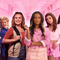 A group of young women with varying facial expressions, mostly wearing pink shades