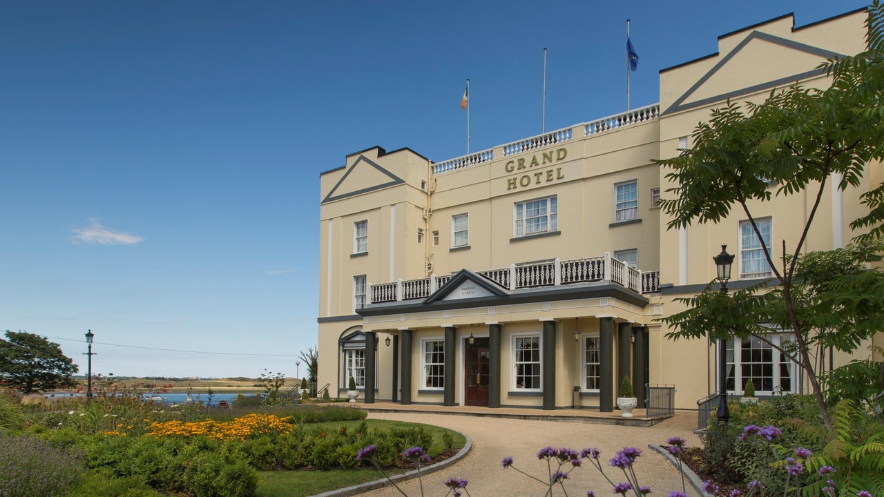 Exterior of hotel with sea view.