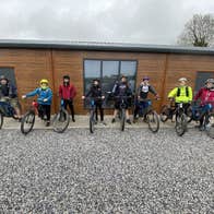 A group with their Bloom E Riders bikes
