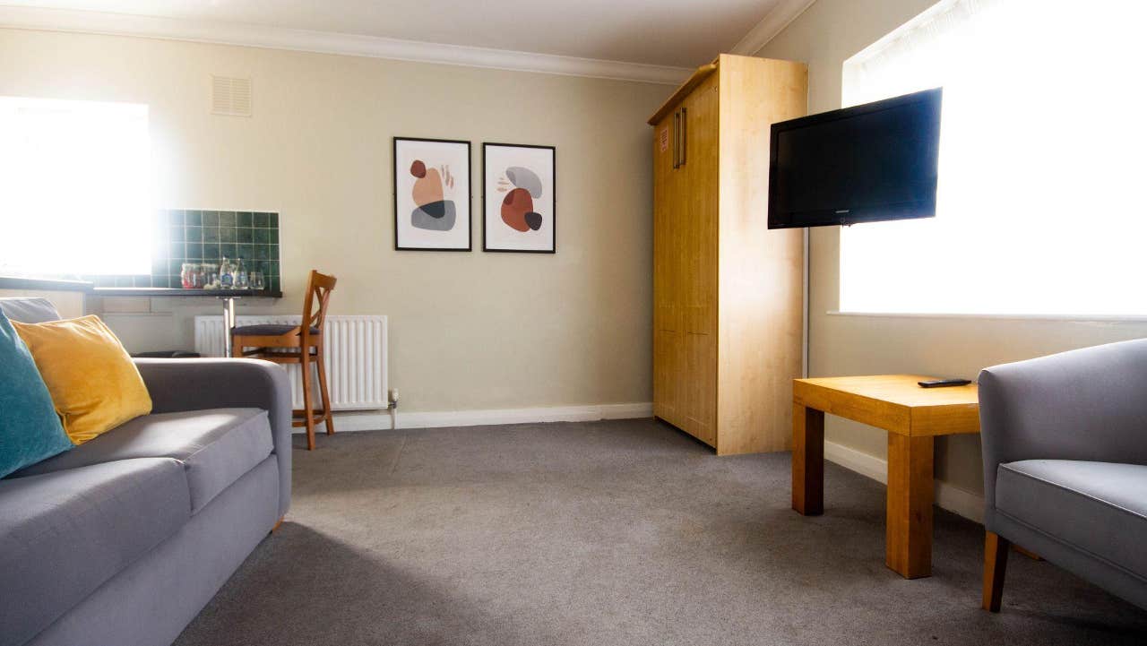 Sitting room with couch and chair