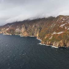 The Slieve League cliffs in Donegal towering above the deep blue sea