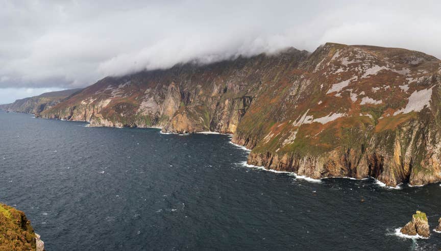 The Slieve League cliffs in Donegal towering above the deep blue sea