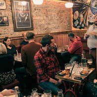 People enjoying a Limerick Whiskey Experience tour in Peggy's Parlour