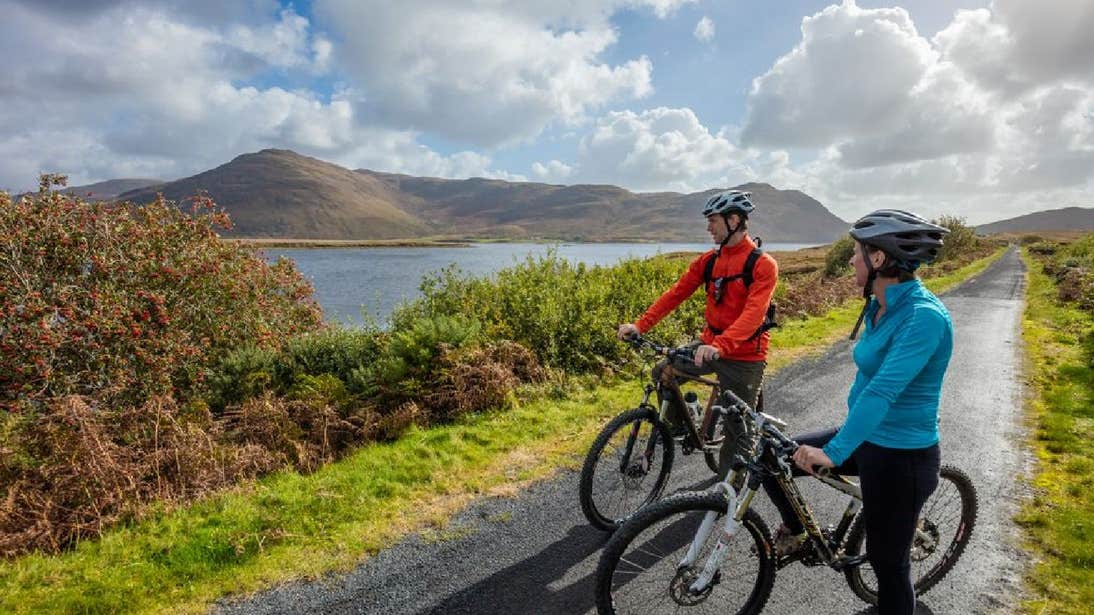 Two cyclists taking a break on the Great Western Greenway in County Mayo