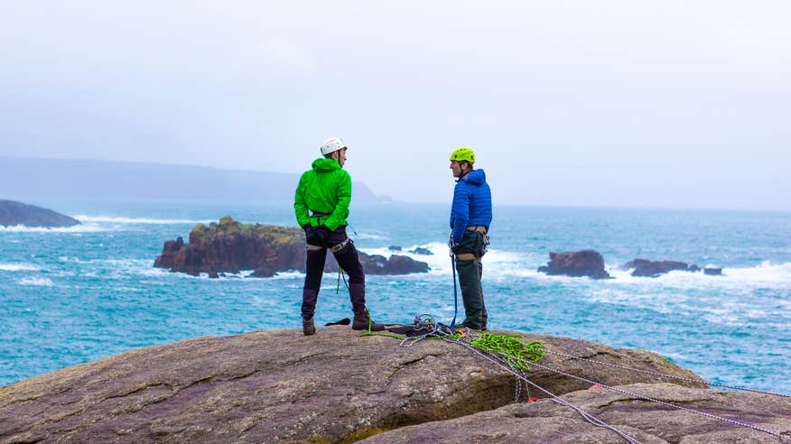 Two men atop a sea stack in Donegal.